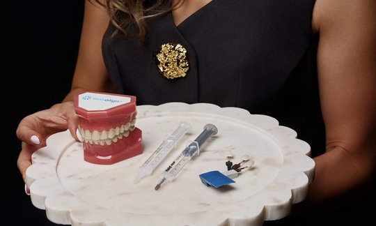 Invisalign clear aligner system with case and cleaning supplies