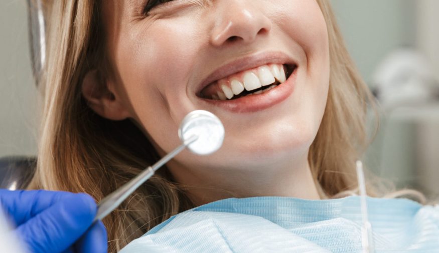 Patient receiving comprehensive dental exam at EVER Dental Studio