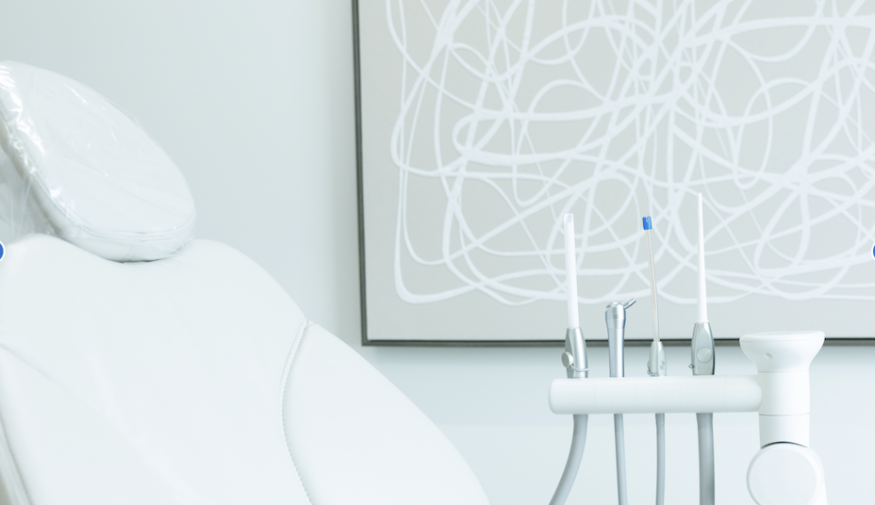 Modern dental exam room with dental chair and instruments at EVER Dental Studio